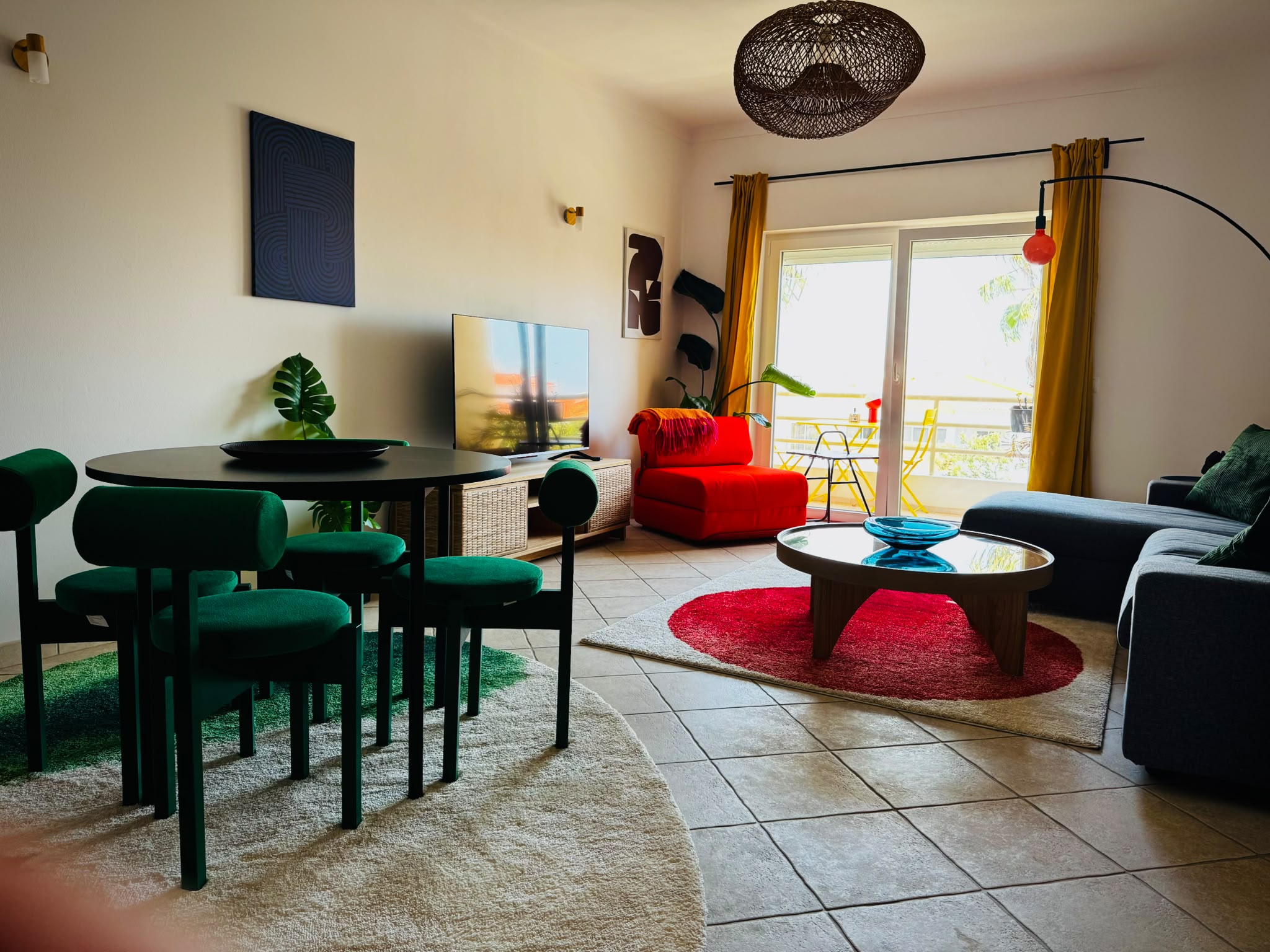 Open-plan living and dining room at Salted House with balcony doors open