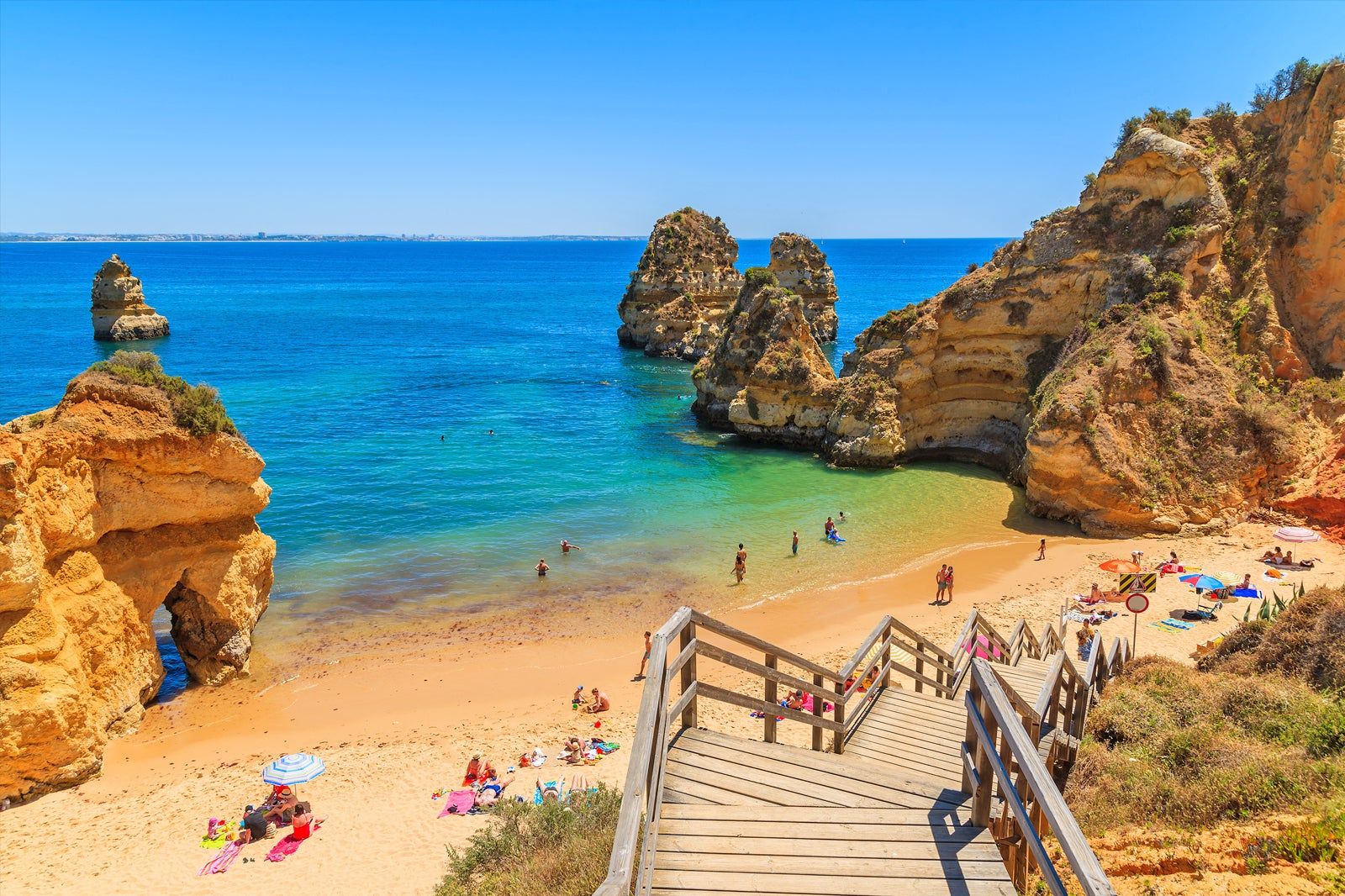 Praia do Camilo and golden cliffs in Lagos